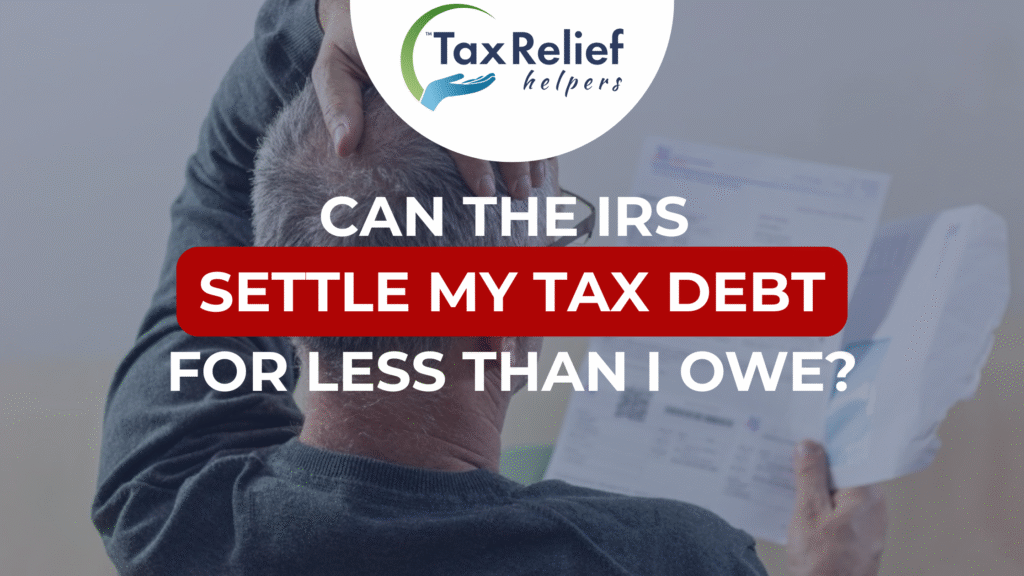 A man reviewing his tax debt with his hand on his head.