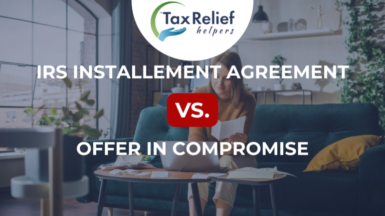 A woman finishing her taxes online in a living room.